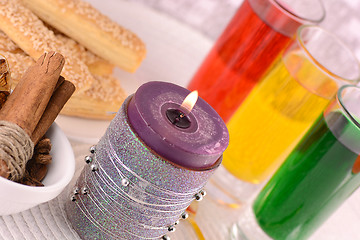 Image showing candles, cake and cinnamon