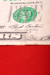 Image showing dollars on american flag