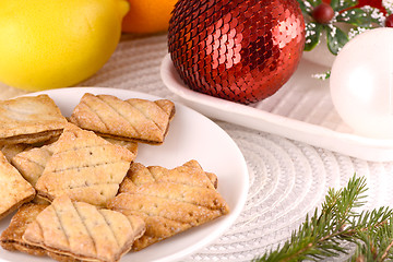 Image showing sweet cake on white plate and fruits