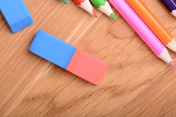 Image showing colored pencils  on wooden background