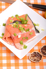 Image showing salmon filet with fresh herbs