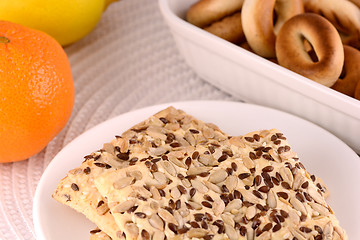 Image showing sweet cake on white plate and fruits