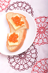 Image showing sandwich with red caviar on white plate