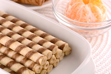 Image showing sweet cake on white plate and fruits