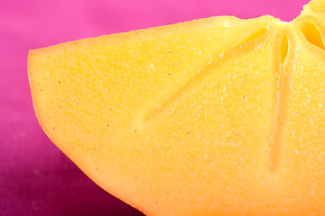 Image showing sharon kakis sliced - japanese persimmons close up