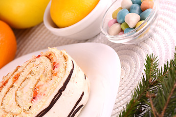 Image showing sweet cake on white plate and fruits