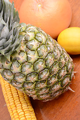 Image showing fresh pineapple with corn and orange