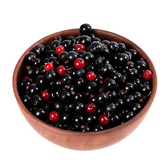 Image showing Blackcurrants and redcurrants in ceramic bowl