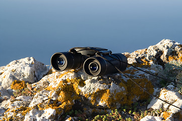 Image showing Binoculars on the rock