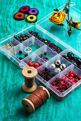 Image showing box with beads and thread 