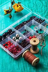 Image showing box with beads and thread 