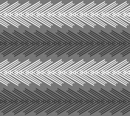 Image showing Monochrome pattern with striped white and black chevron on dark 