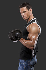 Image showing Muscle man lifting weights