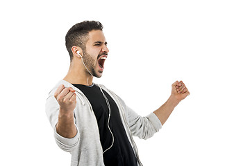 Image showing Man smiling and listen music