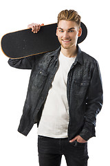 Image showing Young man with a skateboard