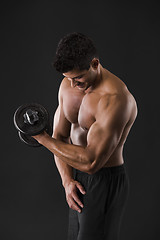 Image showing Muscular man lifting weights