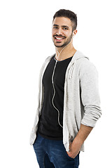 Image showing Man smiling and listen music