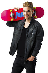 Image showing Young man with a skateboard