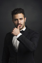 Image showing Latin man wearing a tuxedo