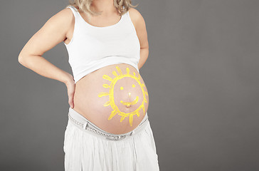 Image showing Baby belly with sun