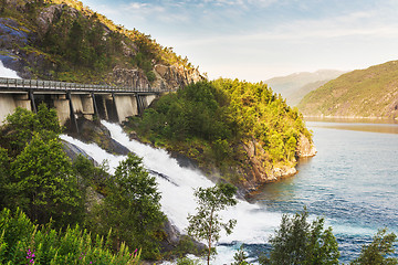 Image showing Road in Norway passing over the waterfall Langfoss