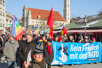 Image showing Anti-NATO protest march against aggressive policy USA in Europe