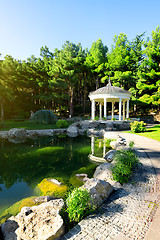 Image showing White arbour near lake