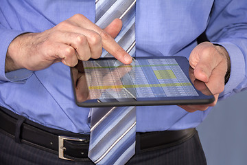 Image showing Businessman using tablet