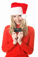 Image showing Christmas Shopping - Santa girl with a gift card