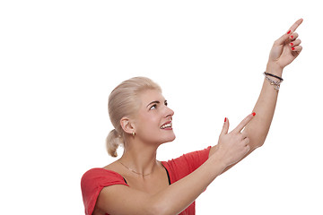 Image showing Happy Blond Woman Pointing Up with Both Hands