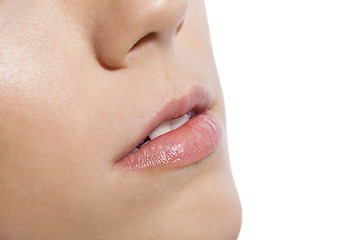 Image showing Close up Pink Lips of a Woman on White Background