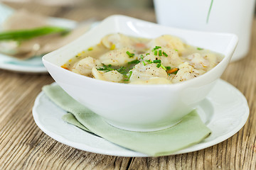 Image showing Dish of savory pork tortellini in broth pelmeni russian