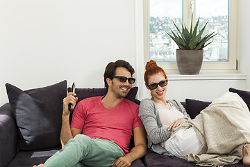 Image showing Sweethearts with 3d glasses Resting on the Sofa