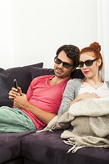 Image showing Sweethearts with 3d glasses Resting on the Sofa