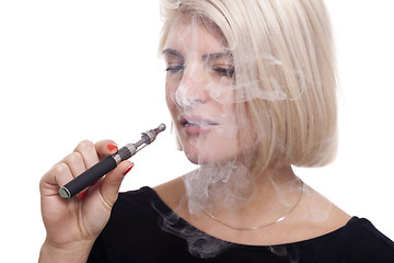 Image showing Close up Blond Woman Smoking Using E- Cigarette