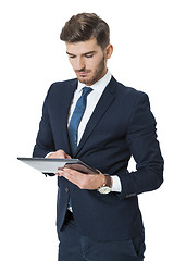Image showing Businessman using a tablet computer