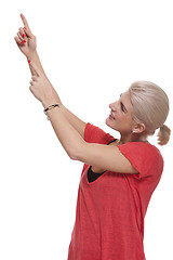 Image showing Happy Blond Woman Pointing Up with Both Hands