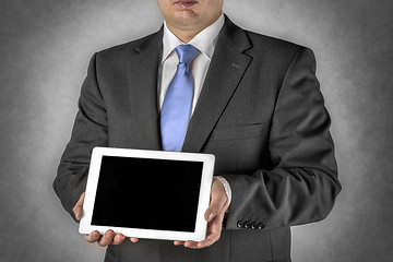 Image showing Businessman with tablet computer