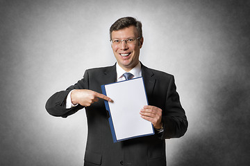 Image showing Businessman with blank folder