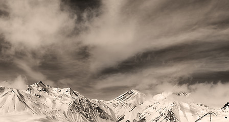 Image showing Sepia winter mountains in fog