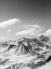 Image showing Black and white snowy mountains in nice sun day