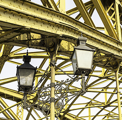 Image showing Decorative lamps hanging from bridge