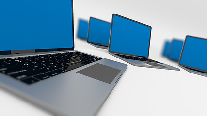 Image showing Many laptops in a circle