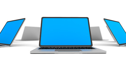 Image showing Laptops in a circle isolated on white.