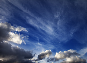 Image showing Sunny sky with clouds in wind evening