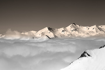 Image showing Vintage winter mountains under clouds