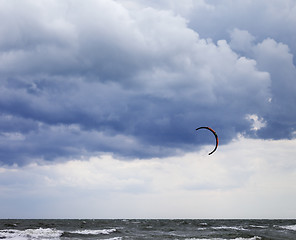 Image showing Power kite in sea and cloudy sky