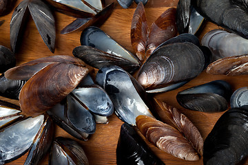 Image showing Shells of mussels on kitchen board