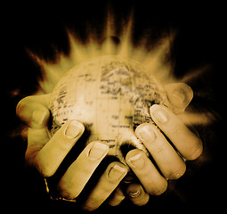 Image showing Globe in a girl\'s hands