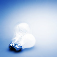 Image showing Background with lit lightbulb